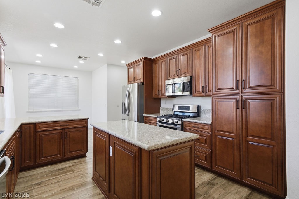 2376 Tilden Way Henderson, NV 89074 - Photo 22 of 54 Open kitchen area with lots of high quality cabinets.