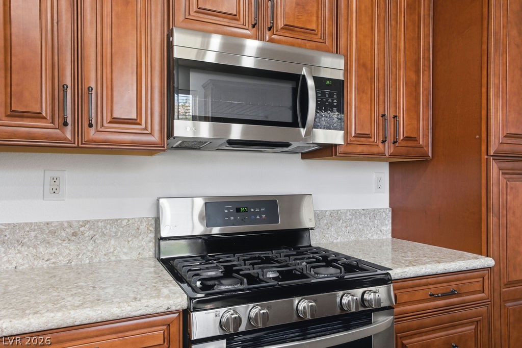 2376 Tilden Way Henderson, NV 89074 - Photo 25 of 54 Kitchen with gas range and built in microwave.