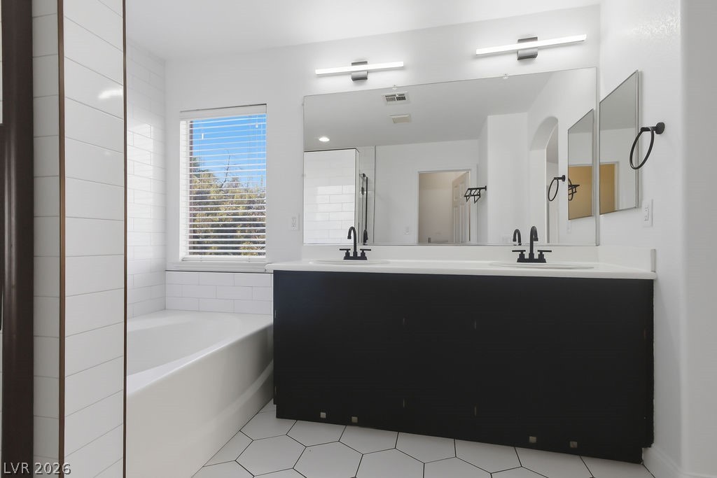 2376 Tilden Way Henderson, NV 89074 - Photo 37 of 54 Double vanity in Primary bathroom.