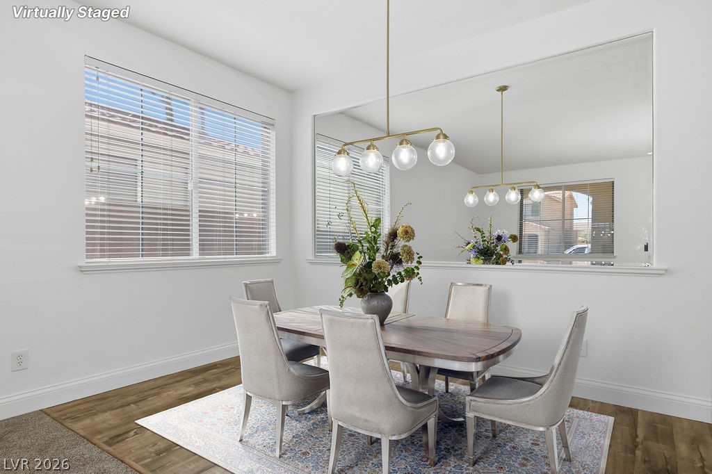 2376 Tilden Way Henderson, NV 89074 - Photo 7 of 54 Formal dining area by family room. This picture is virtually staged.