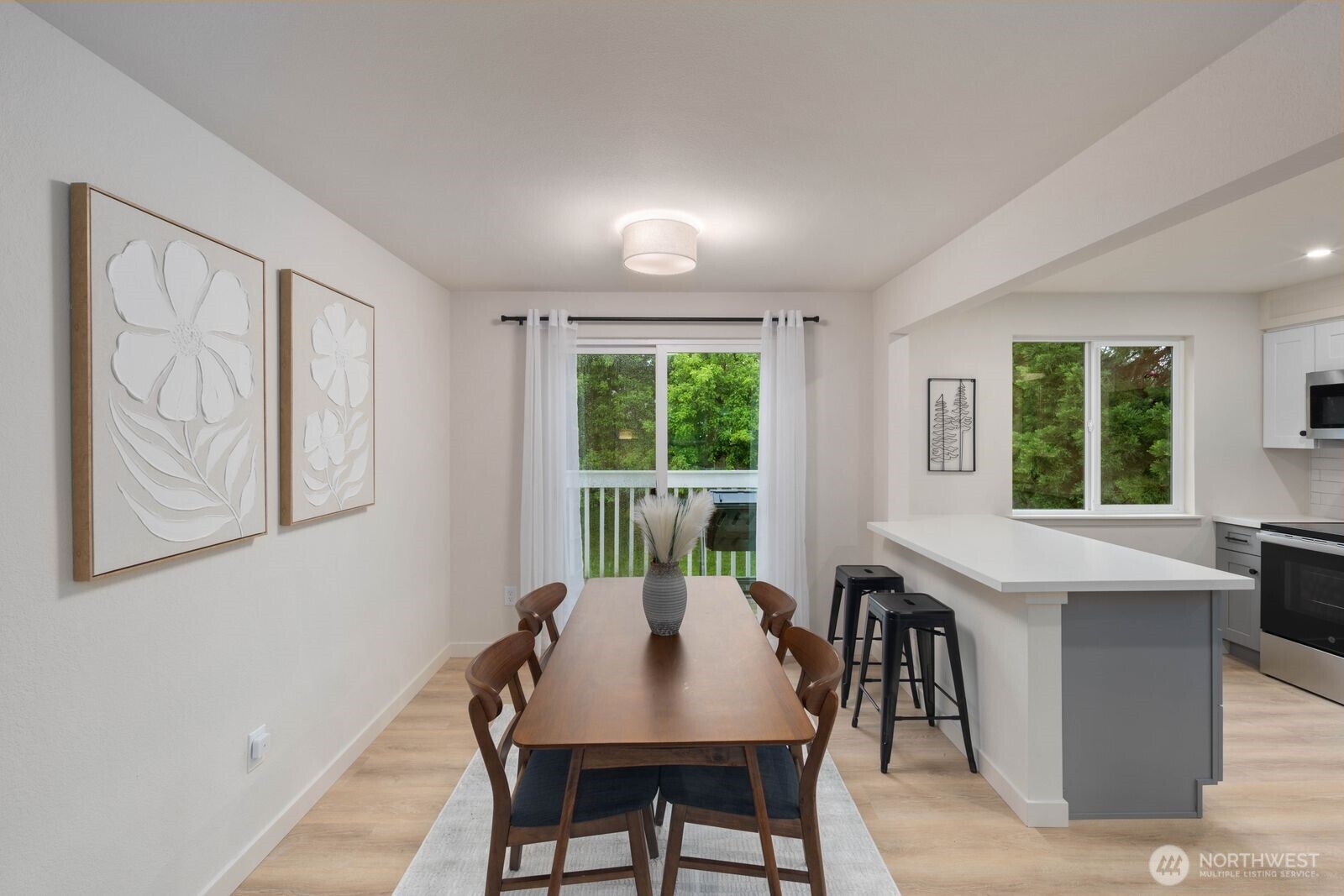 612 19th Street Snohomish, WA 98290 - Photo 11 of 33 a view of a dining room with furniture window and outside view