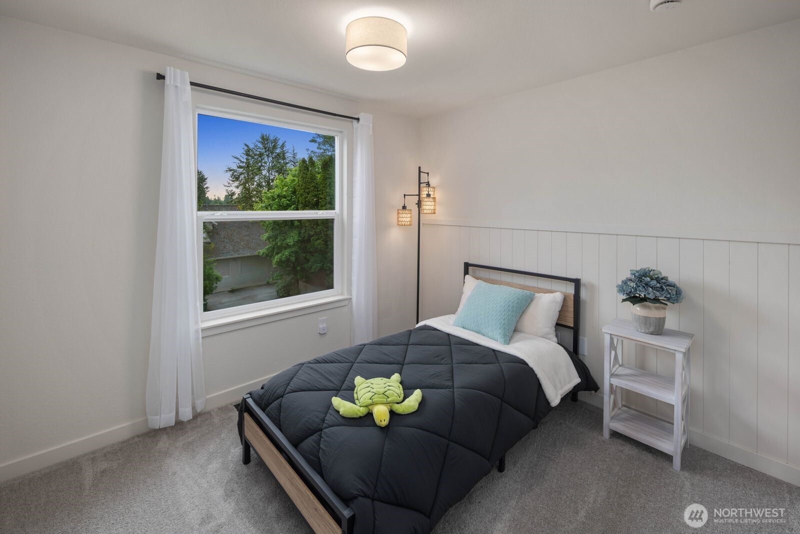 612 19th Street Snohomish, WA 98290 - Photo 21 of 33 a bedroom with a bed couch and window