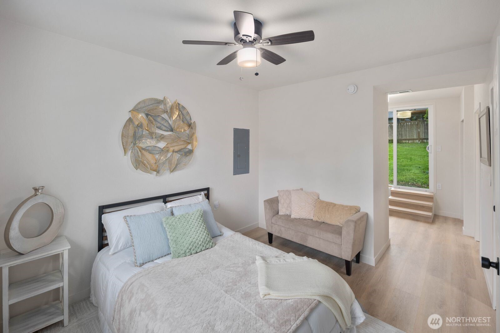 612 19th Street Snohomish, WA 98290 - Photo 24 of 33 a bedroom with a bed and a chandelier