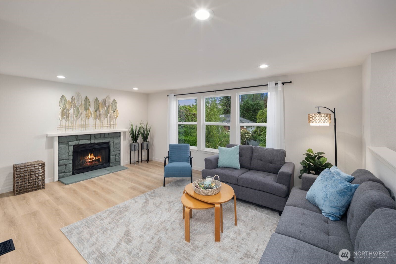 612 19th Street Snohomish, WA 98290 - Photo 5 of 33 a living room with furniture and a fireplace
