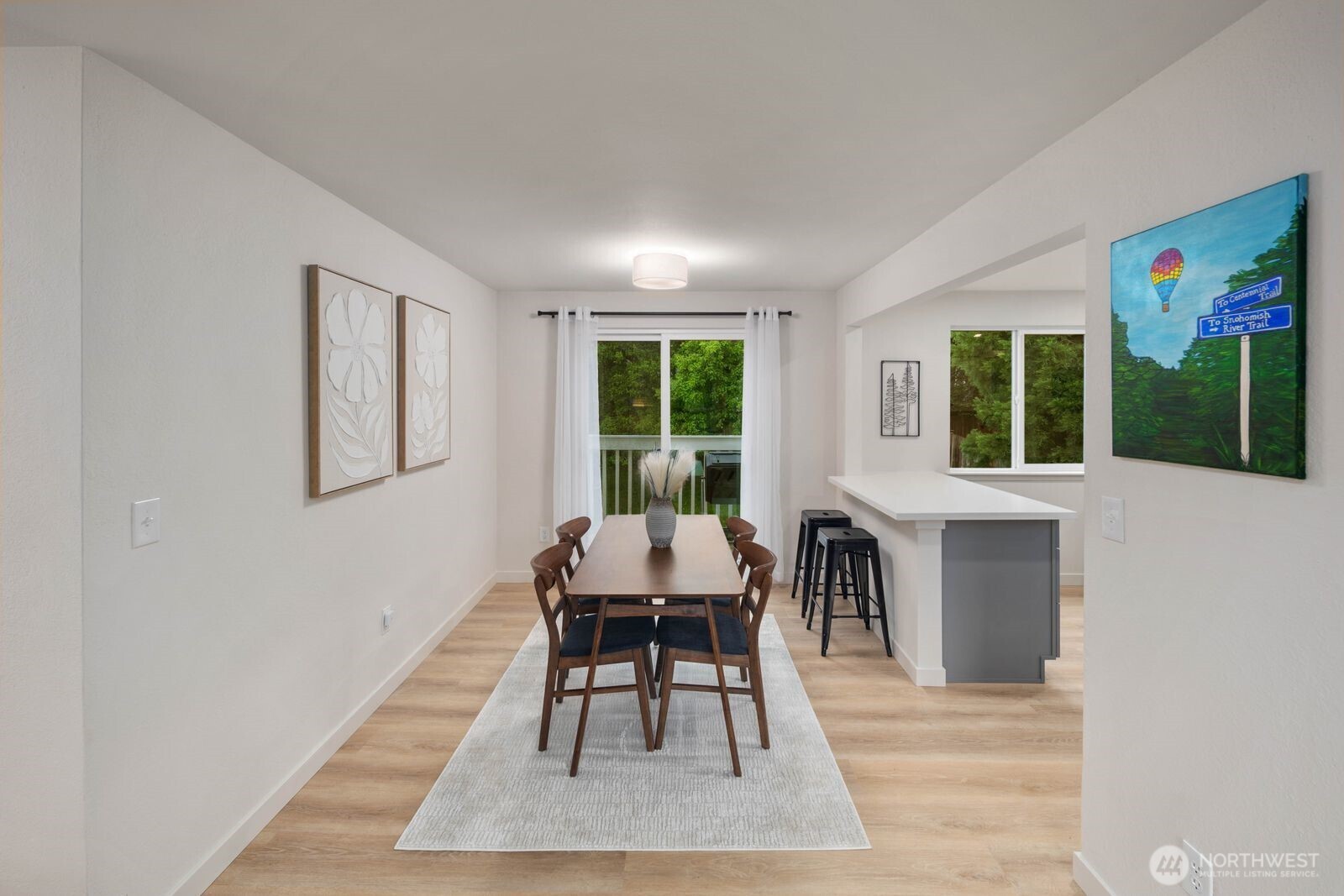 612 19th Street Snohomish, WA 98290 - Photo 10 of 33 a dining room with wooden floor and windows