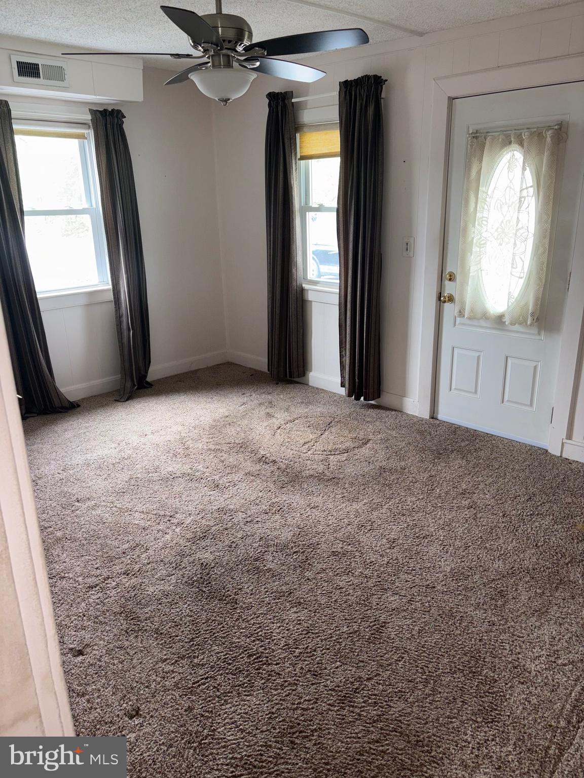 25 Baker Street Aberdeen, MD 21001 - Photo 15 of 23 an empty room with windows and closet