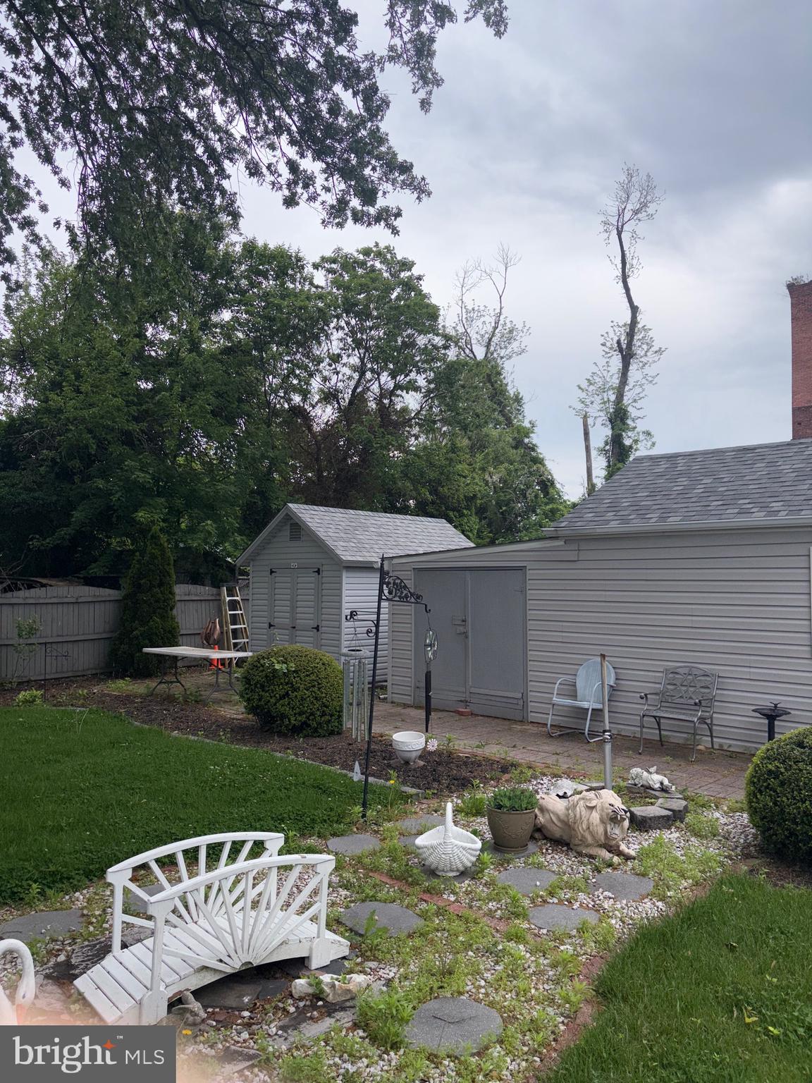 25 Baker Street Aberdeen, MD 21001 - Photo 5 of 23 a view of a house with backyard and sitting area