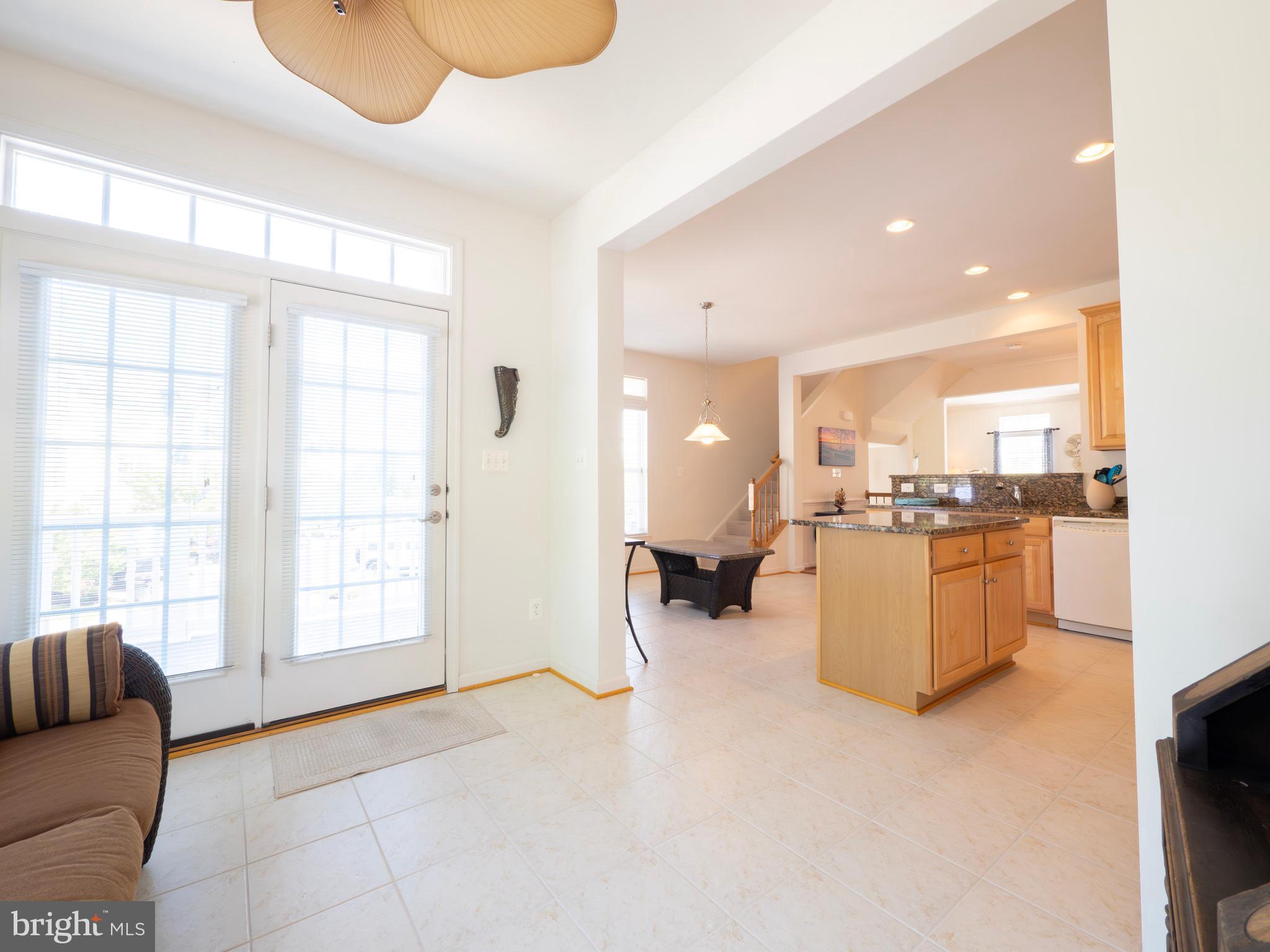 301 Monroe Point Drive Colonial Beach, VA 22443 - Photo 16 of 33 a view of a living room kitchen and a window