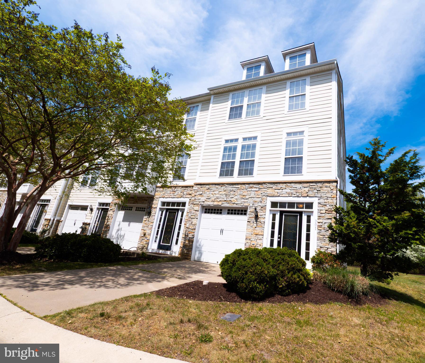 301 Monroe Point Drive Colonial Beach, VA 22443 - Photo 2 of 33 a front view of a house with a yard