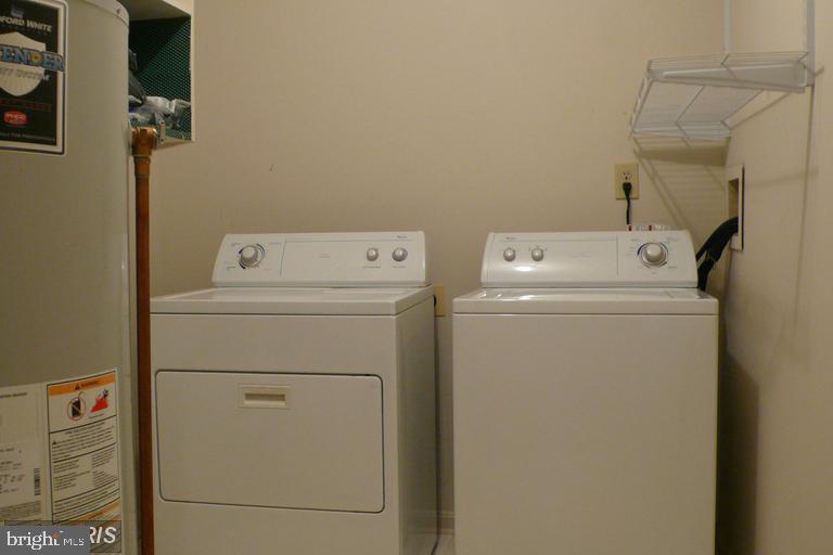 104 Timberlake Terrace, Unit 12 Stephens City, VA 22655 - Photo 8 of 8 a utility room with dryer and washer
