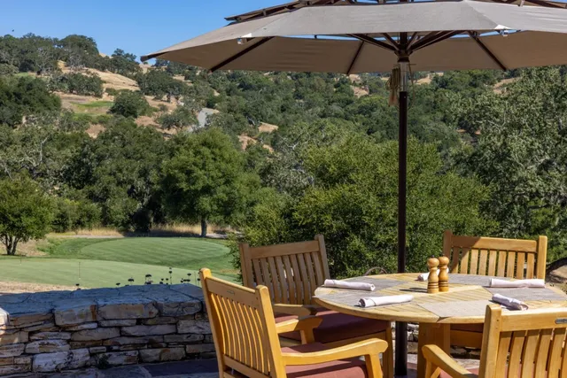 a view of a patio in backyard