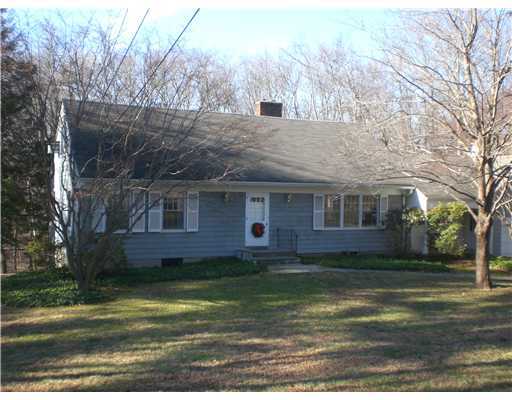 137 Cutler Road Greenwich, CT 06831 - Photo 1 of 20 a view of a house with a yard