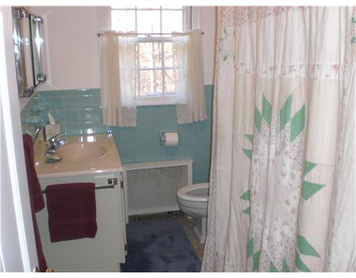137 Cutler Road Greenwich, CT 06831 - Photo 11 of 20 a bathroom with a sink a toilet and shower