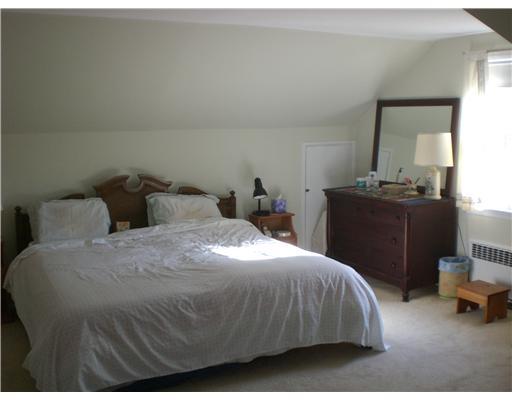 137 Cutler Road Greenwich, CT 06831 - Photo 18 of 20 a bedroom with a bed and window