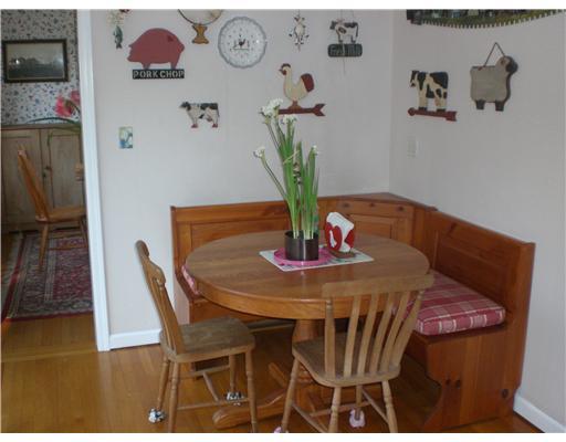 137 Cutler Road Greenwich, CT 06831 - Photo 8 of 20 a dining room with furniture and wooden floor