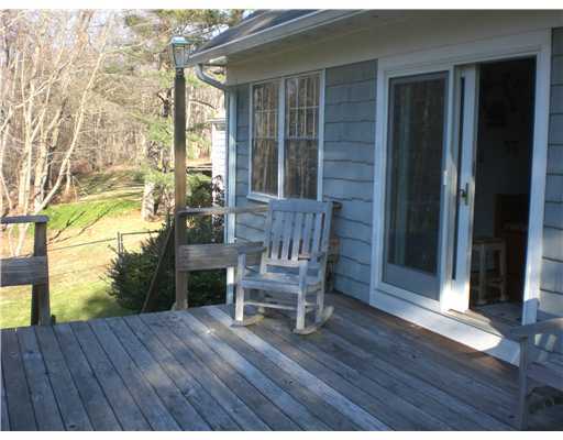 137 Cutler Road Greenwich, CT 06831 - Photo 9 of 20 a deck view with a seating space