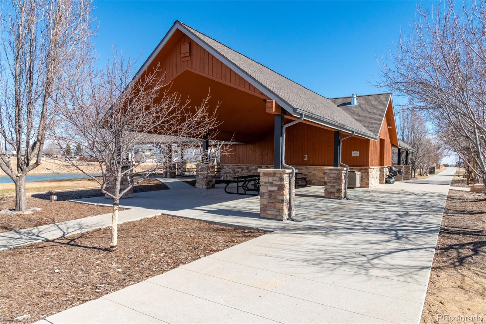 203 Hubbell Street Berthoud, CO 80513 - Photo 47 of 49 a front view of a house with a yard