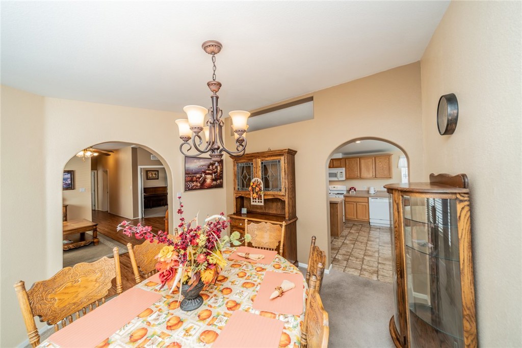 22241 Nisqually Road, Unit 118 Apple Valley, CA 92308 - Photo 3 of 56 a view of a living room and dining room