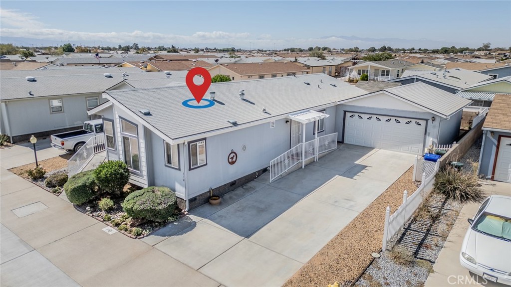 22241 Nisqually Road, Unit 118 Apple Valley, CA 92308 - Photo 39 of 56 an aerial view of residential houses with outdoor space