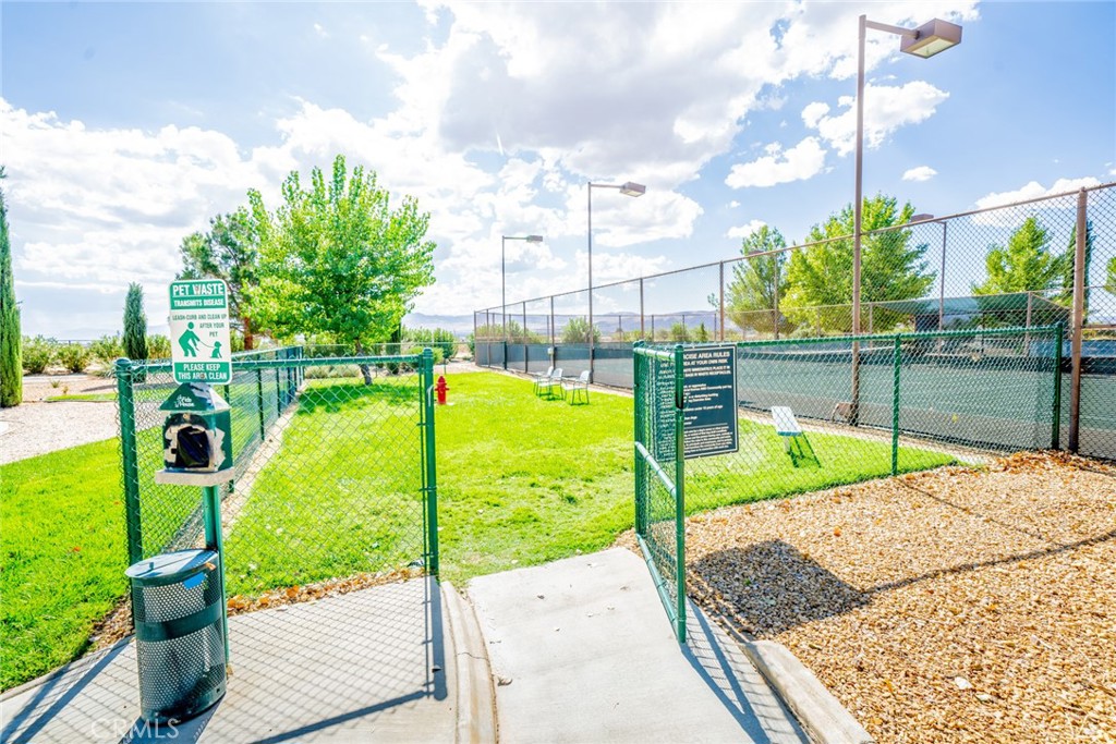 22241 Nisqually Road, Unit 118 Apple Valley, CA 92308 - Photo 48 of 56 a view of a backyard