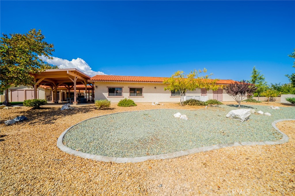 22241 Nisqually Road, Unit 118 Apple Valley, CA 92308 - Photo 50 of 56 a view of a swimming pool with an outdoor space