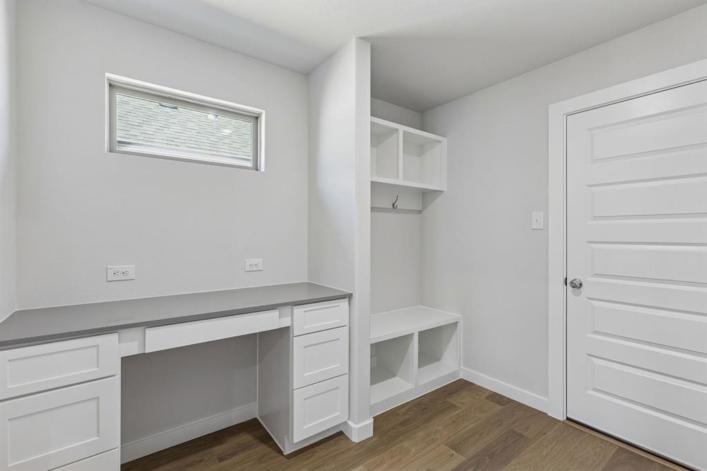 1152 Del Rio Drive Lavon, TX 75166 - Photo 15 of 33 a view of an empty room with wooden floor