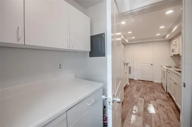 a kitchen with a sink and refrigerator