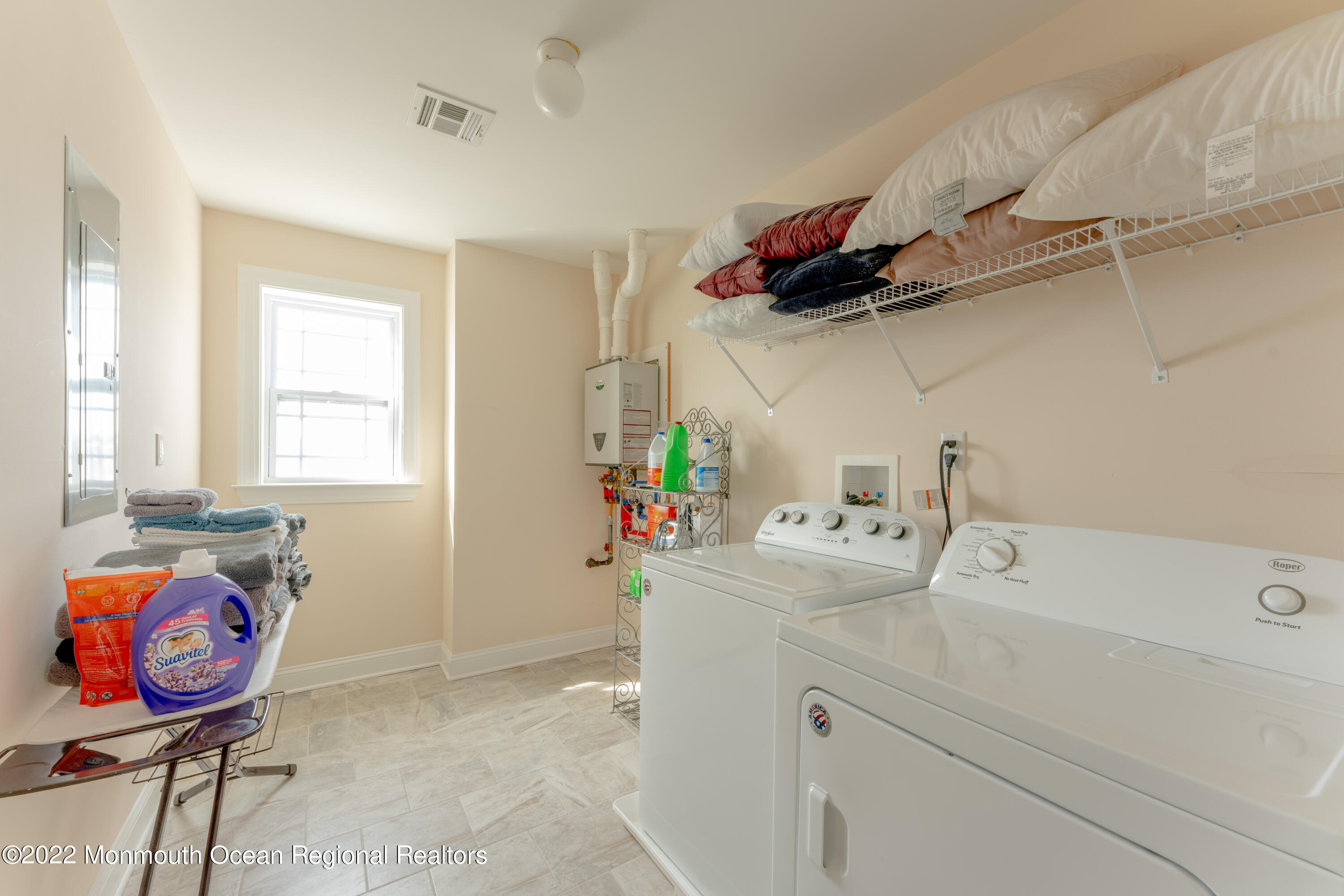 122 Mathis Drive Brick, NJ 08723 - Photo 27 of 35 a bathroom with a sink mirror vanity and window