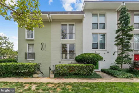 a house that has a lot of plants in it