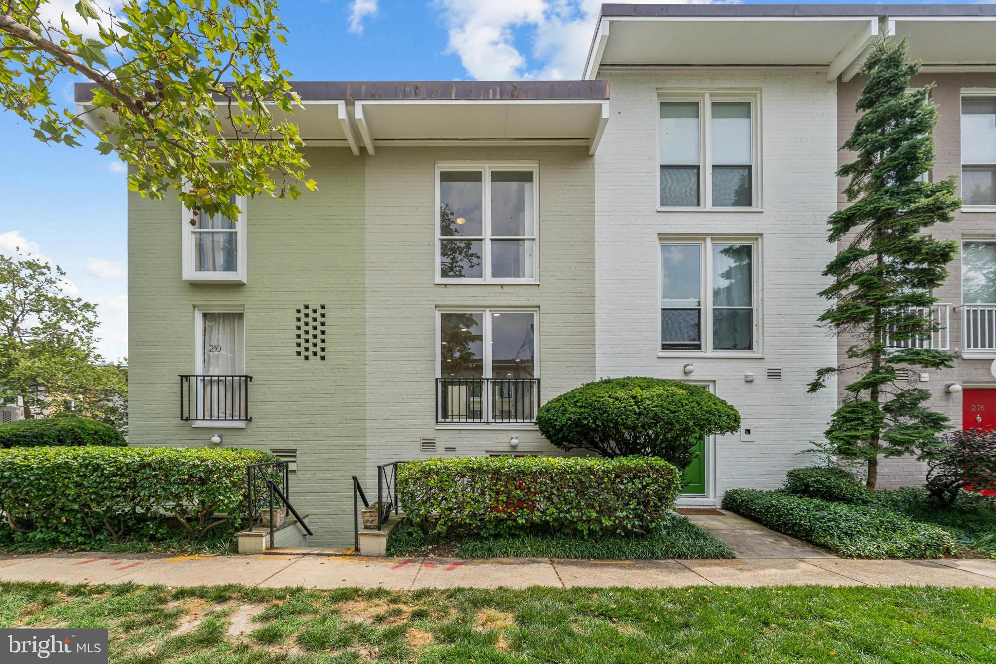 a house that has a lot of plants in it