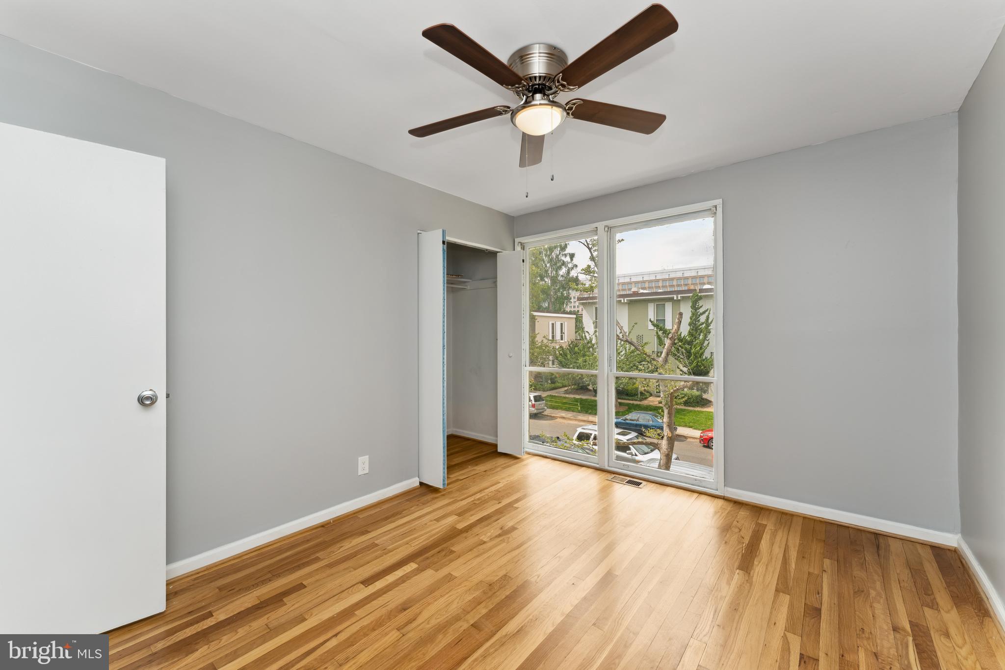 212 G Street Southwest, Unit 212 Washington, DC 20024 - Photo 12 of 17 a view of an empty room with a window