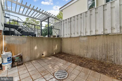 a view of a room with wooden walls