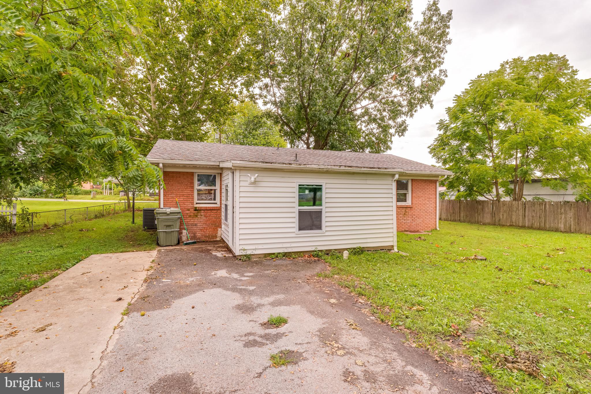 203 Boundary Street Ranson, WV 25438 - Photo 22 of 45 a view of a house with backyard and a tree