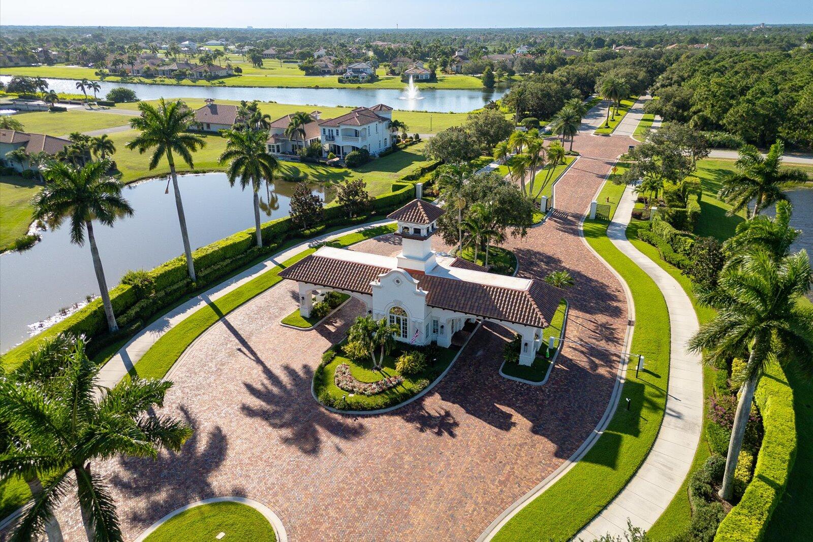 109 Southeast Rio Palermo Port St. Lucie, FL 34984 - Photo 7 of 8 an aerial view of swimming pool with outdoor seating and city view