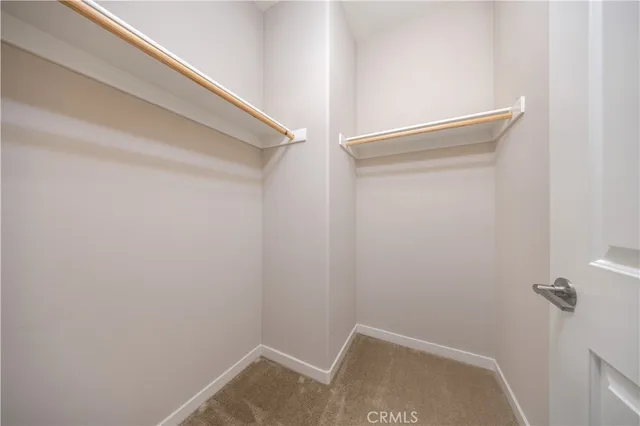 a living room with furniture and windows