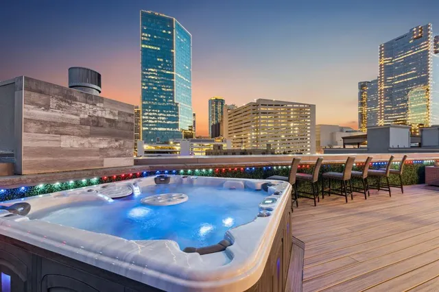 a view of a balcony with chairs