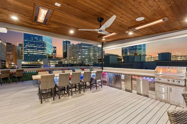 a view of a swimming pool with outdoor seating