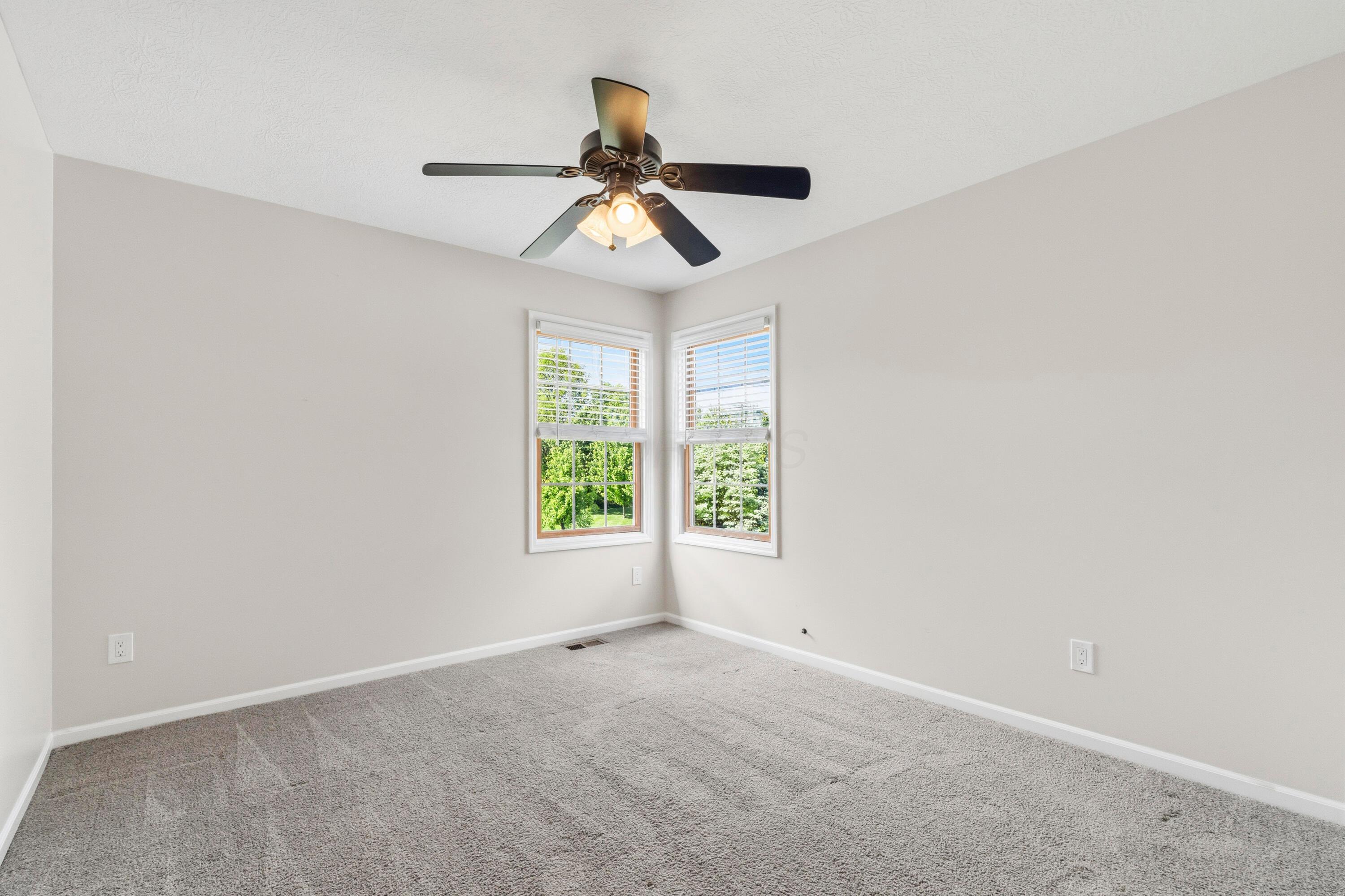 8507 Benner Road Johnstown, OH 43031 - Photo 41 of 69 Large Bedroom #4 with ceiling fan and NEW Carpet!