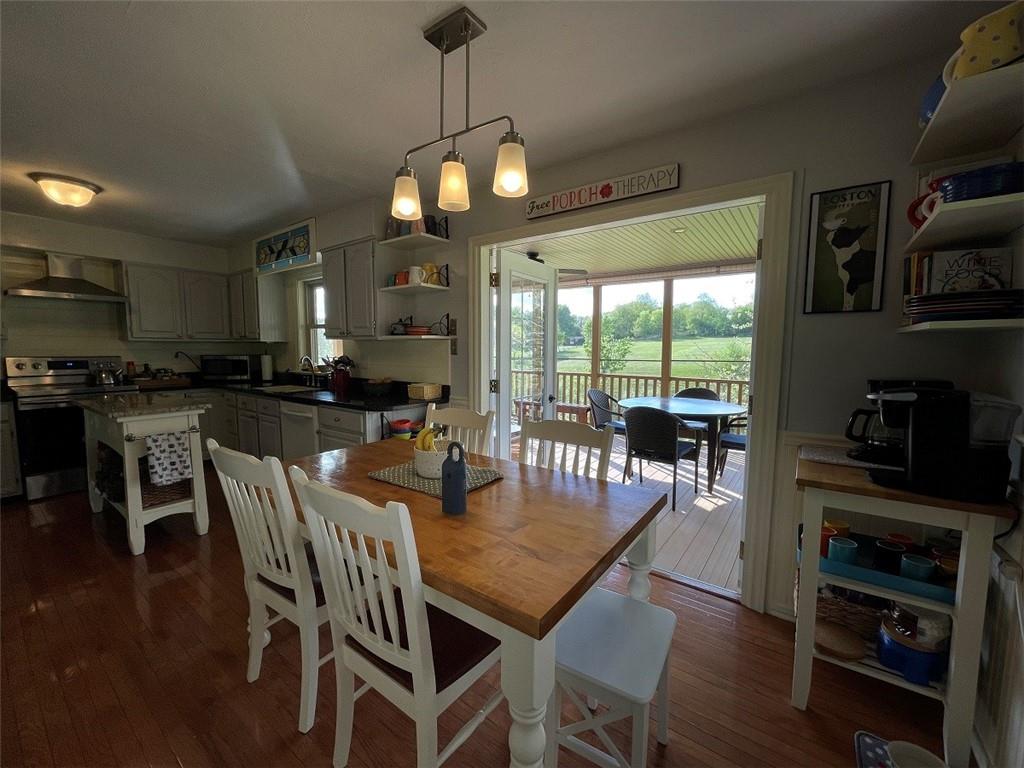 603 Stable Road Indiana, PA 15701 - Photo 5 of 25 a view of a dining room with furniture window and wooden floor