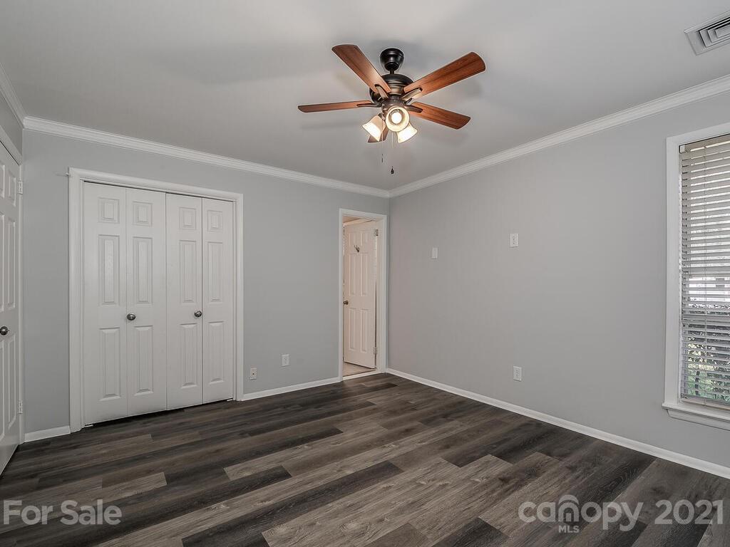5223 Seacroft Road Charlotte, NC 28210 - Photo 14 of 23 a view of a livingroom with wooden floor and window