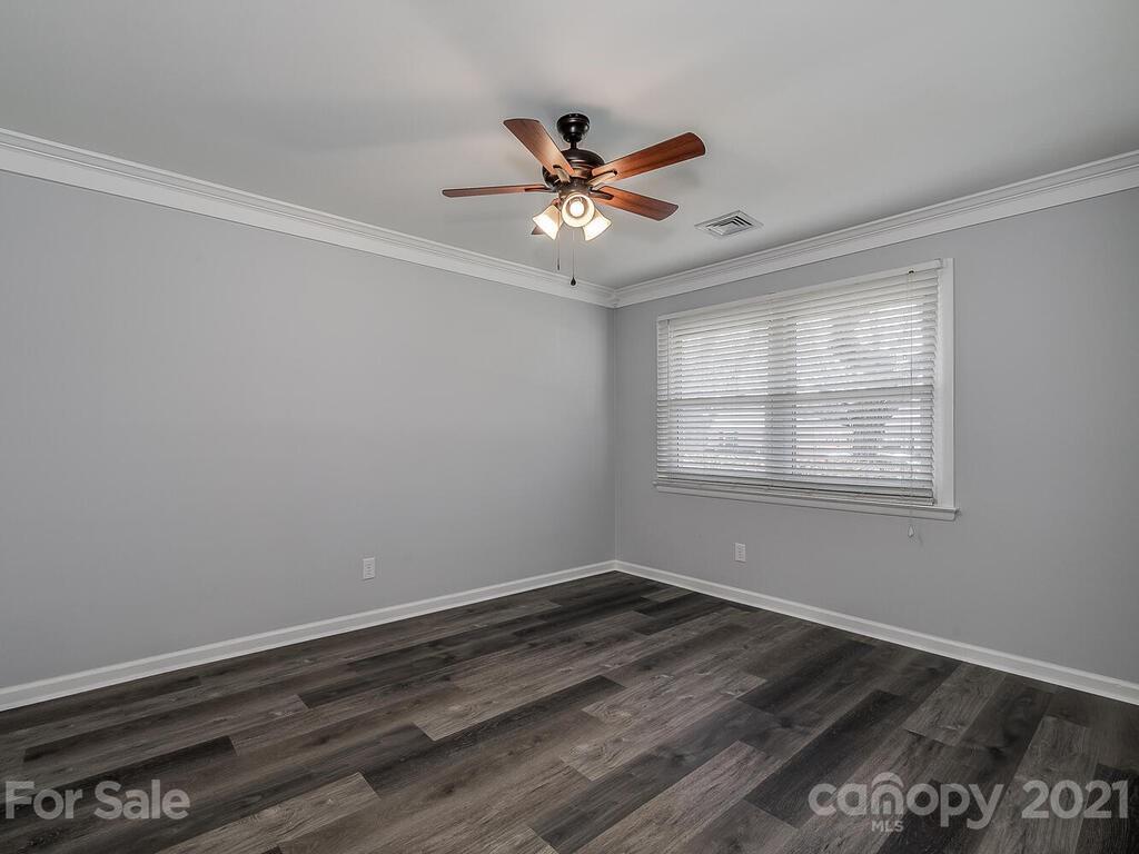 5223 Seacroft Road Charlotte, NC 28210 - Photo 18 of 23 a view of wooden floor in a room