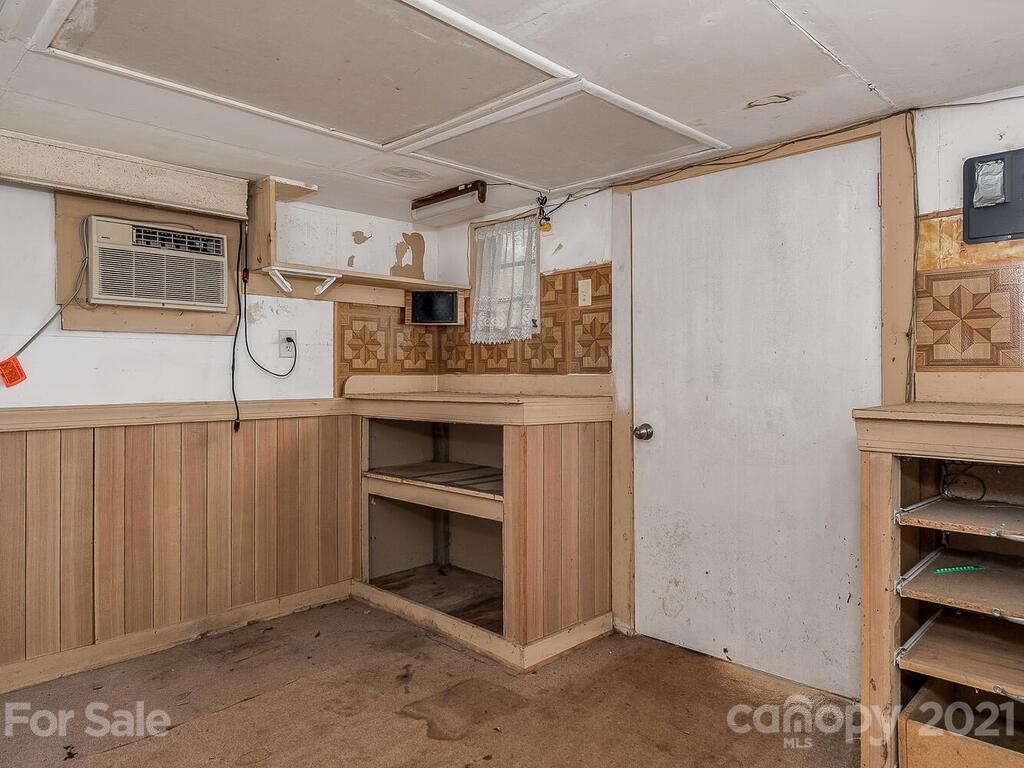 5223 Seacroft Road Charlotte, NC 28210 - Photo 22 of 23 a view of kitchen with cabinets and wooden floor
