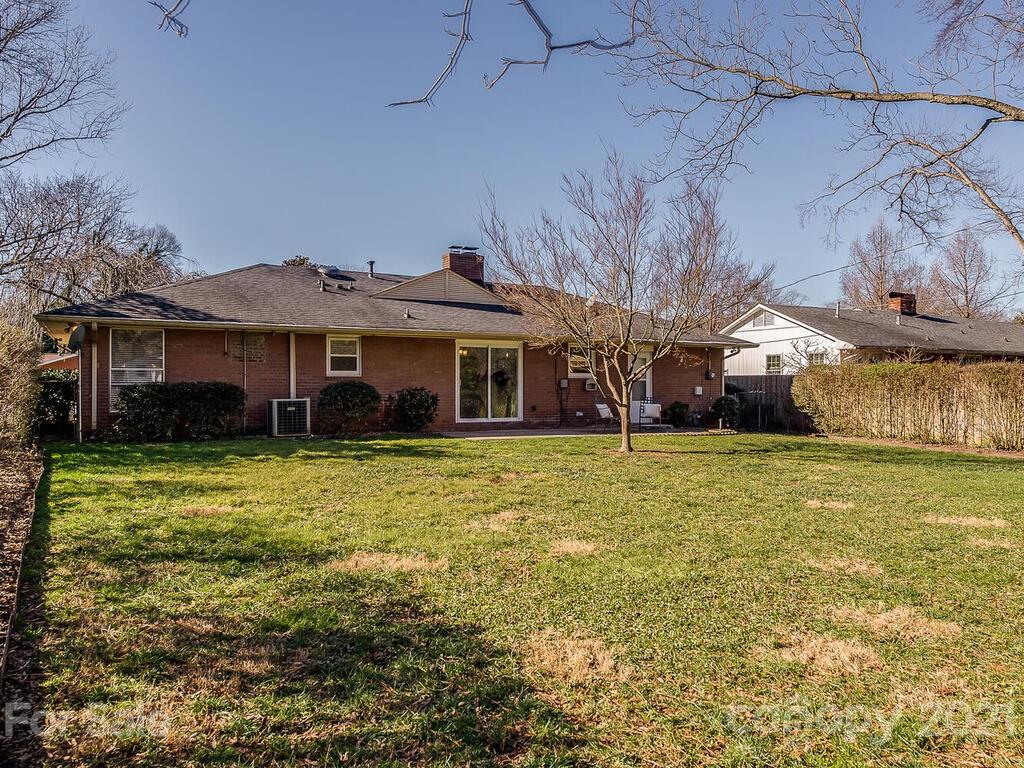 5223 Seacroft Road Charlotte, NC 28210 - Photo 23 of 23 a front view of a house with a garden