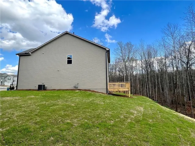 a view of a backyard with a house