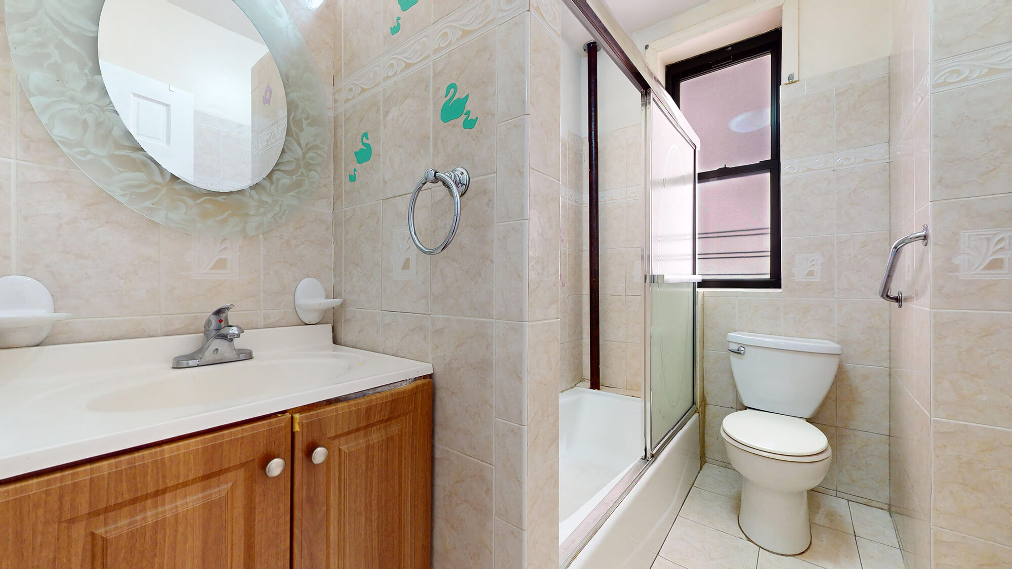 Undisclosed Address Manhattan, NY 10031 - Photo 12 of 13 a bathroom with a sink a toilet and a mirror