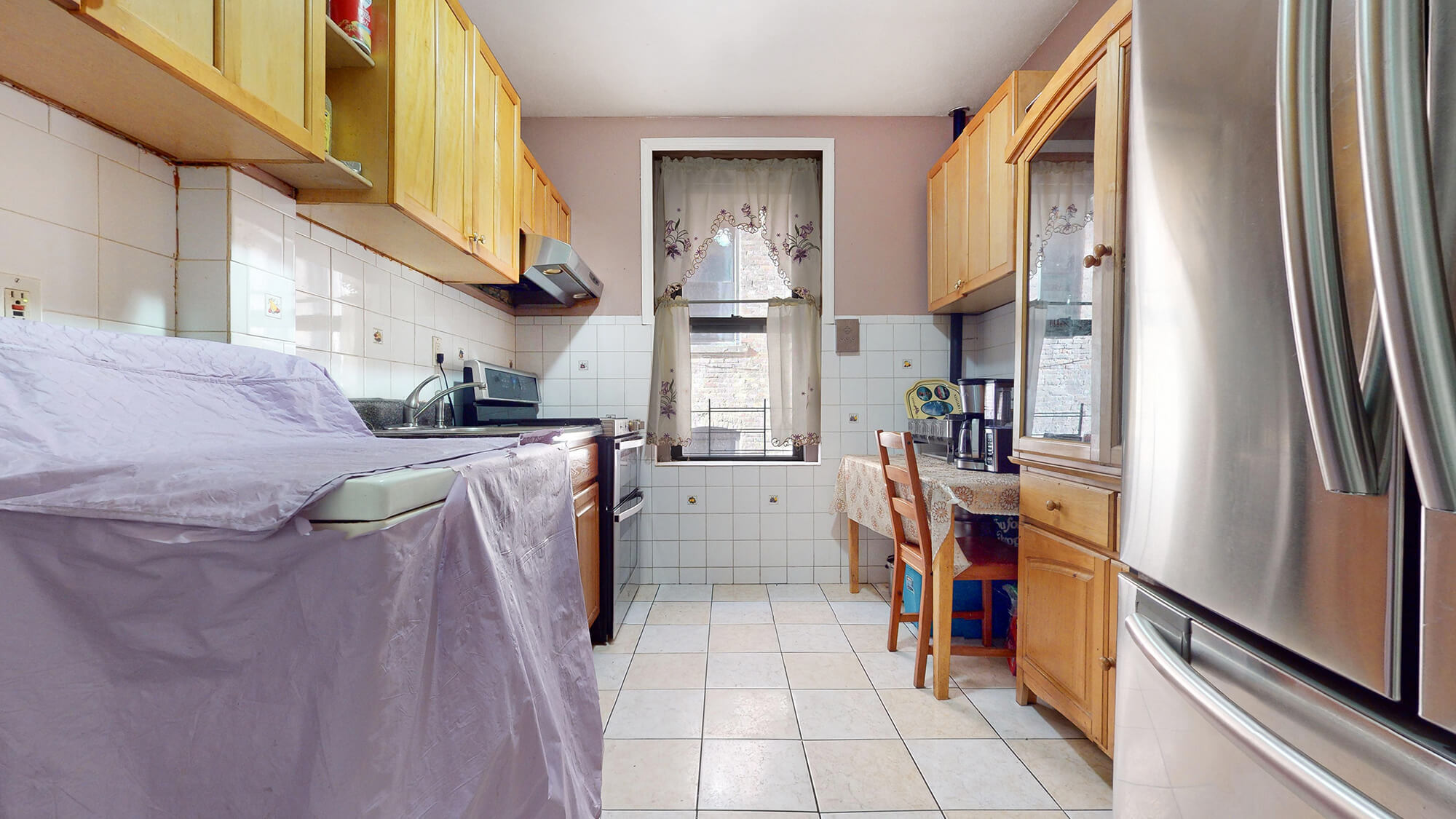 Undisclosed Address Manhattan, NY 10031 - Photo 7 of 13 a kitchen with a refrigerator and washer