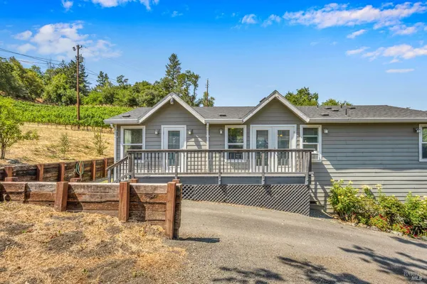 a view of house with outdoor space