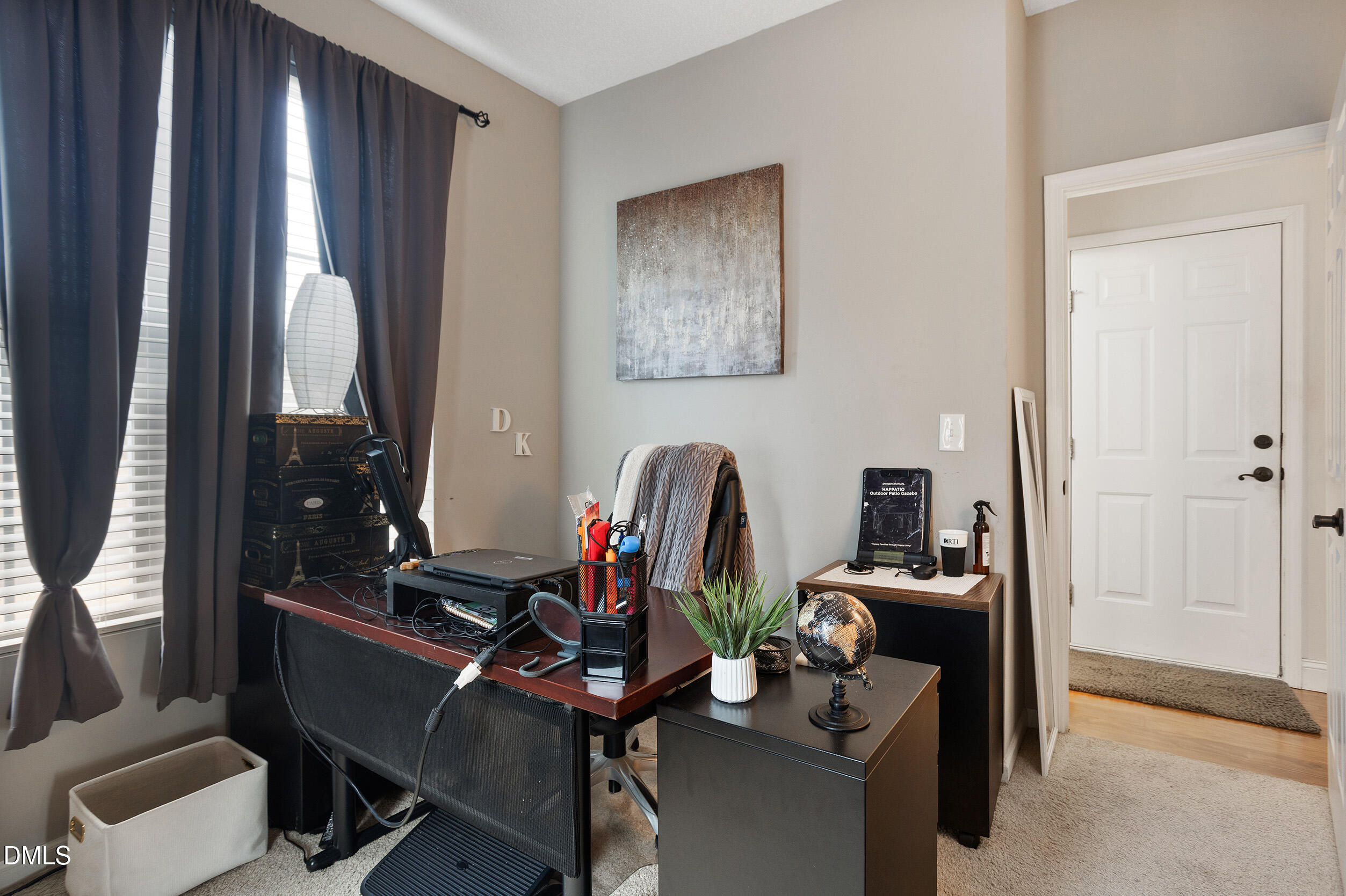 101 Cedar Key Landing Garner, NC 27529 - Photo 16 of 37 a view of a workspace with furniture and a window