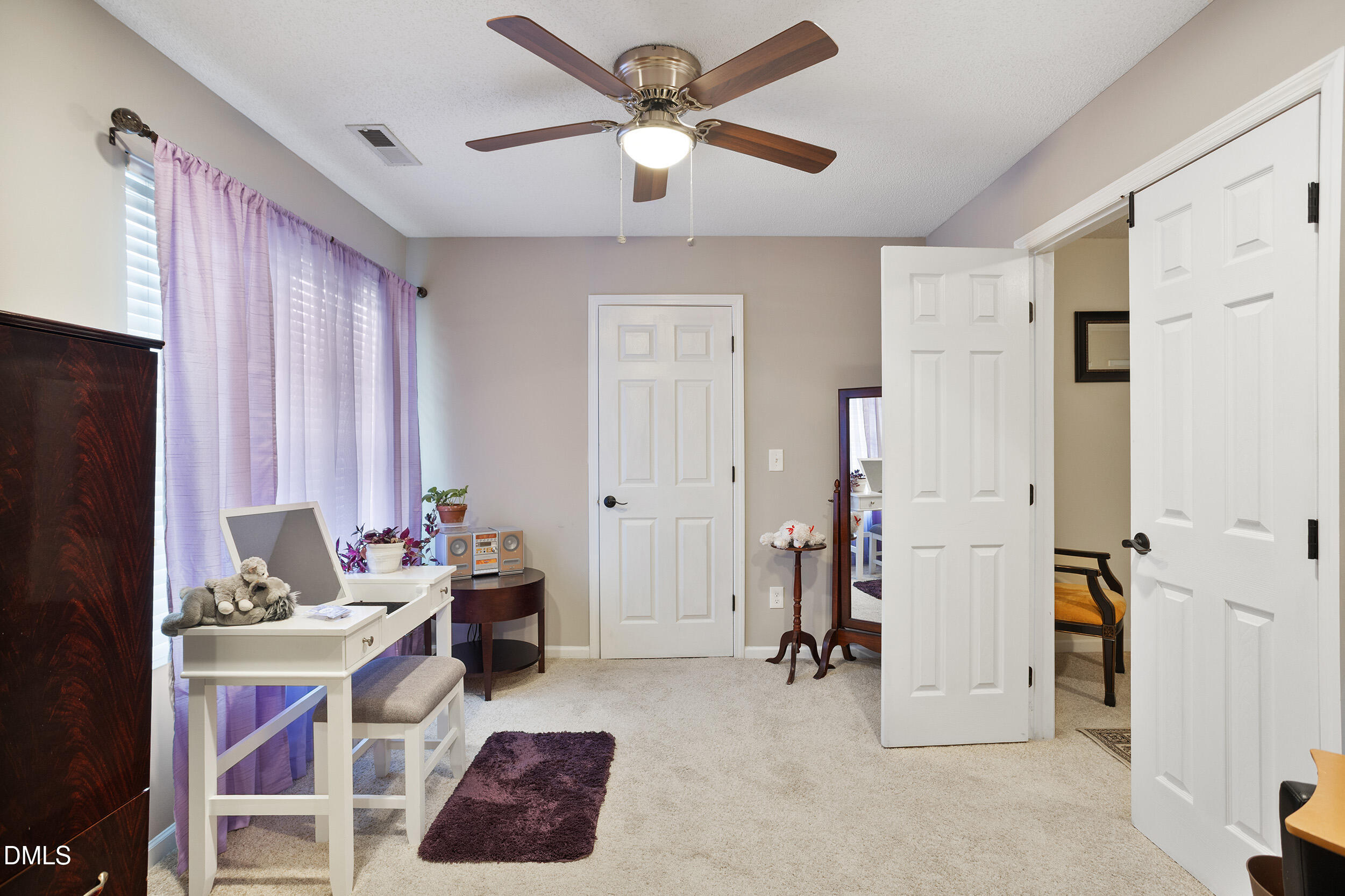 101 Cedar Key Landing Garner, NC 27529 - Photo 25 of 37 a bedroom with furniture and a window