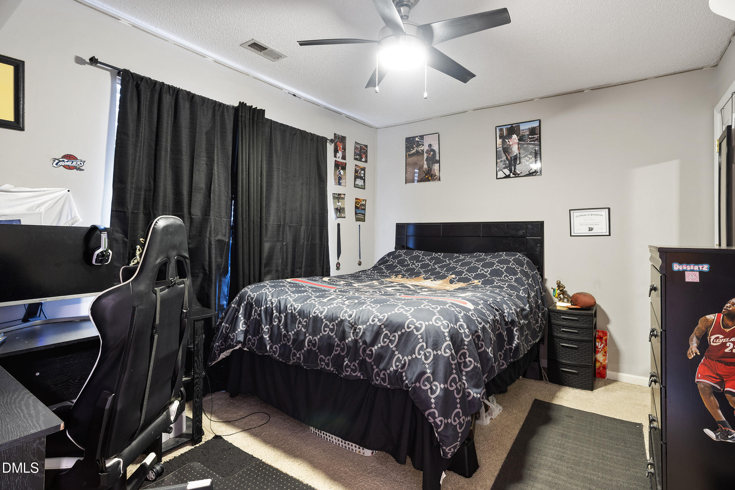 101 Cedar Key Landing Garner, NC 27529 - Photo 27 of 37 a bed sitting in a bedroom next to a window